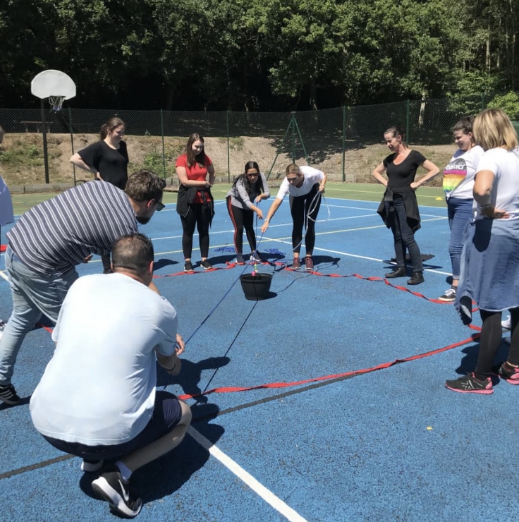 People doing a team building exercise